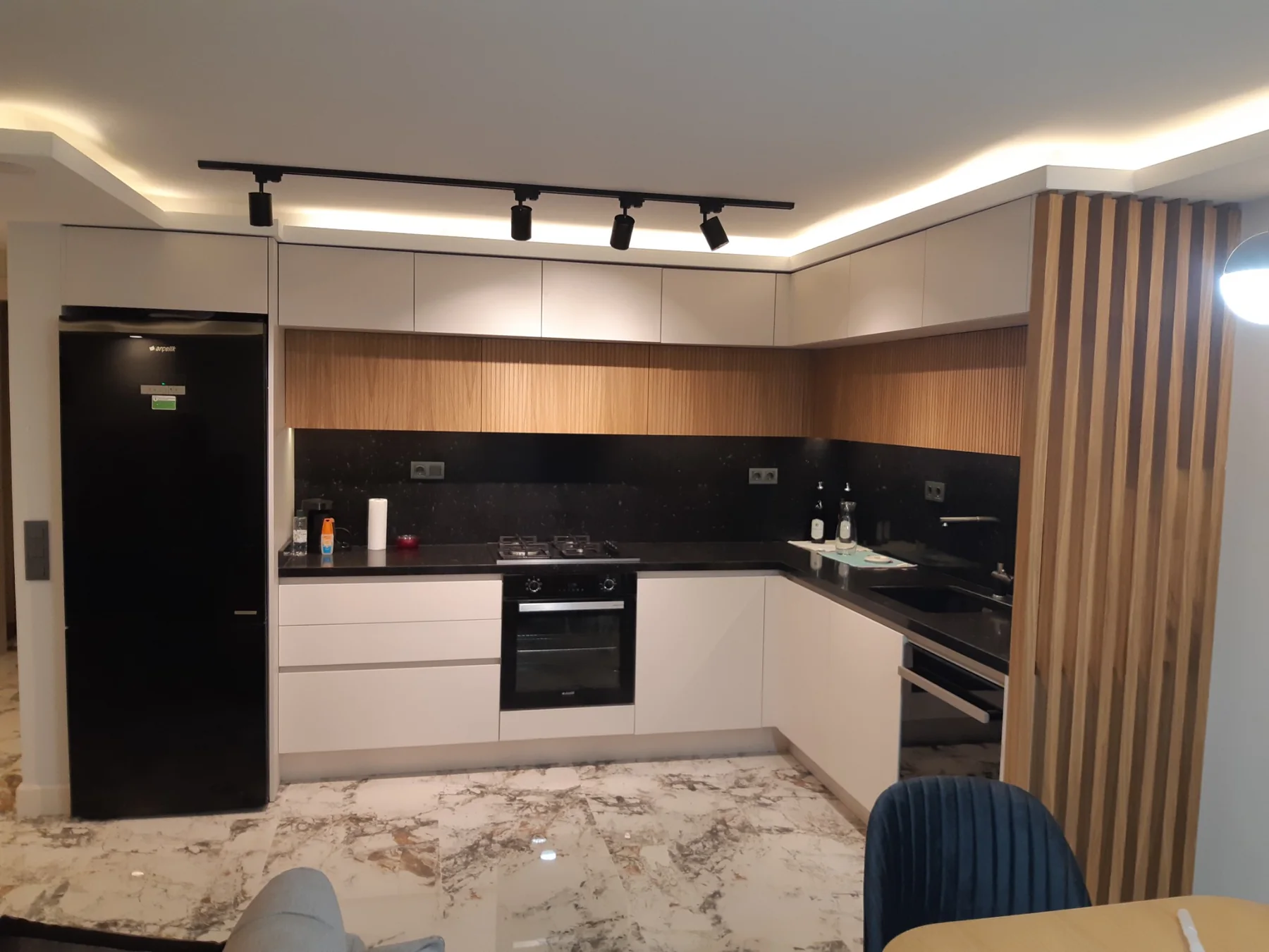 Kitchen with Fluted Wood Details